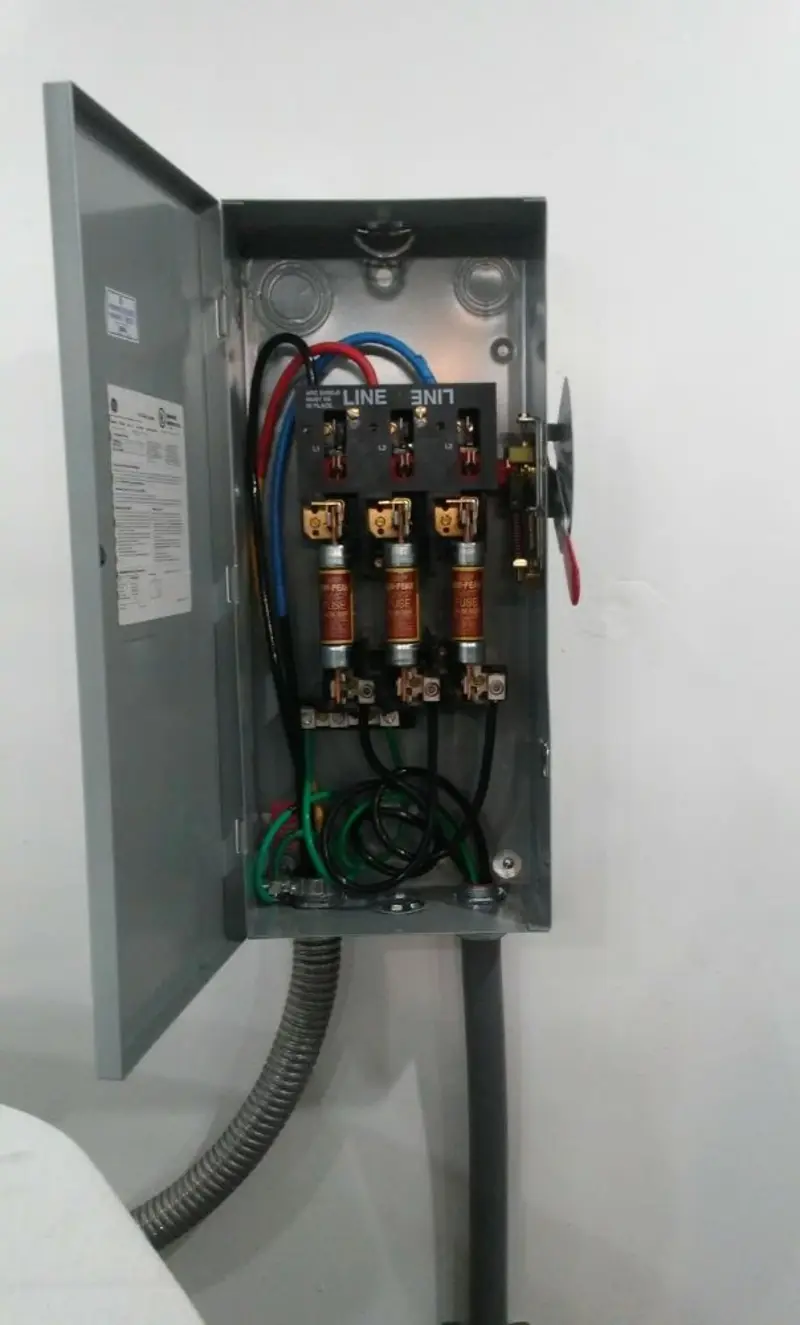 Three-phase disconnect switch installed for Smoke Detector Installation in Bloomer